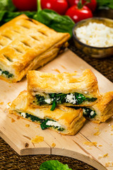 Spinach and Feta Cheese Strudel. Puff Pastry Filled with Spinach and Ricotta Cheese. Selective focus.