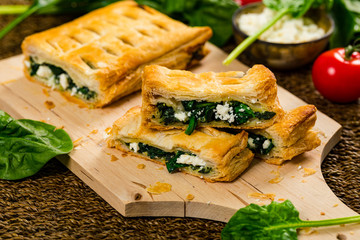 Spinach and Feta Cheese Strudel. Puff Pastry Filled with Spinach and Ricotta Cheese. Selective focus.