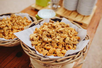 bowl with crispy pork rinds for appetizer