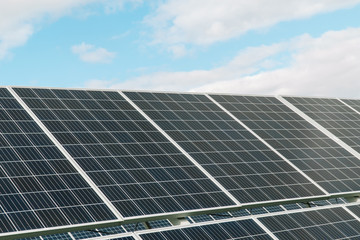 Solar panels on the blue sky background. Concept of green energy, clean energy, renewable energy
