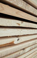 Wooden planks. Air-drying timber stack.