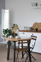 White kitchen, tables and chairs