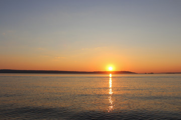 Sunset at sea. Sky and water