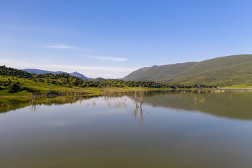 Beautiful view of lake and mountains in a natural preserve in spain