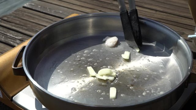 Fry the garlic before the meat