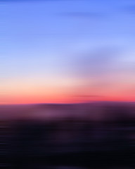 Naklejka na ściany i meble moody motion blur of landscape at sunset with blue pink purple gradients