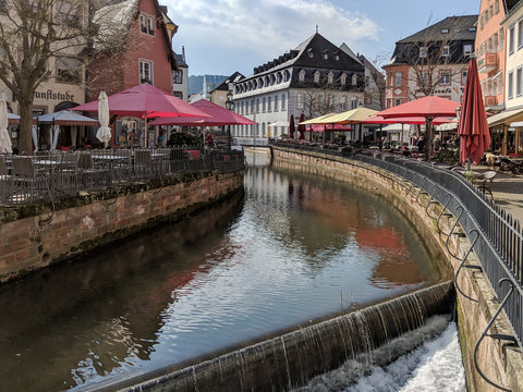 Saarburg, Germany - April 13 2019: Leukbach river crossing the old town of Saarburg