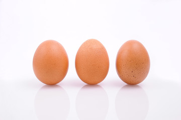 Three eggs isolated on a white