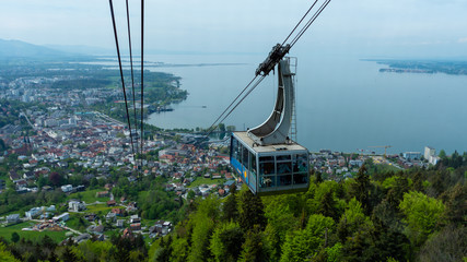 Bregenz, Austria - May 2 2019: View of the Pfander cable car (Pfanderbahn), with the city of...