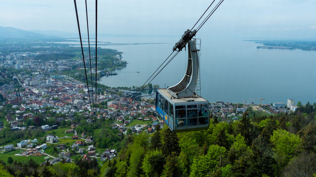 Bregenz, Austria - May 2 2019: View of the Pfander cable car (Pfanderbahn), with the city of Bregenz and lake Bodensee in the background