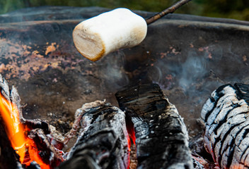 marshmellow on stick roasting over open fire