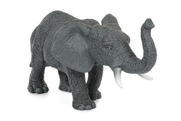 Fototapeta premium Elephant toy figure on white background