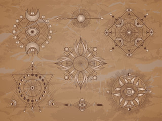 Vector set of Sacred symbols with moon, eye, sun and geometric figures on old paper background. Abstract mystic signs collection drawn in lines. Image in sepia color. 