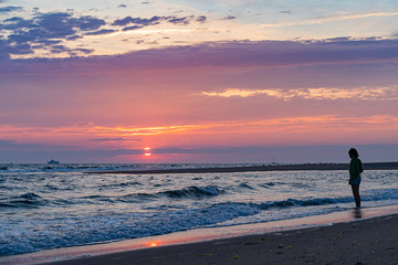 Fototapeta premium Sunset on the beach on north side of the Provincelands Cape Cod, Atlantic ocean view MA US.