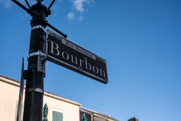 Fototapeta na wymiar Bourbon Street Sign On Blue Sky