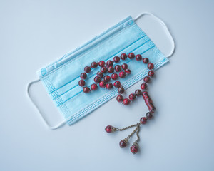 Medical mask and beads or tasbih islamic concept