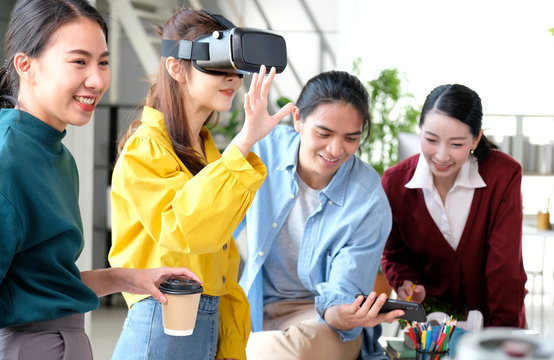 VR mobile phone application test, Asian woman with virtual reality glasses headset in VR experience, Asia business team developers for reality simulator smartphone app test at creative office, ui
