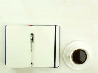 workplace of an office employee, work space, concept of the beginning of a working day, morning coffee, top view, place for text