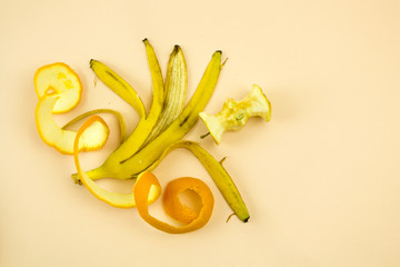 banana and orange peel and apple core, food waste, trash and food residues, sorting and processing,...