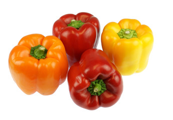 close up on fresh colorful peppers isolated on white background