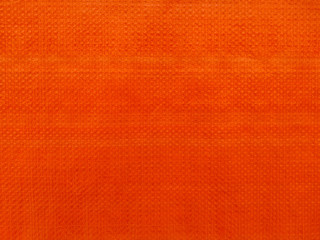 Orange tarpaulin plastic texture - obrazy, fototapety, plakaty