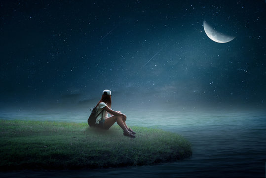 The girl sitting on the moon alone Stock Photo | Adobe Stock