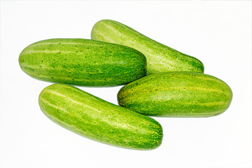 Fresh green cucumber on white background.