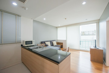 Stylish kitchen interior with dining table and chairs