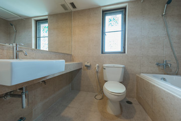 White tiled modern restroom