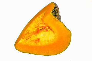 Sliced green ripe Indian pumpkin on white background.