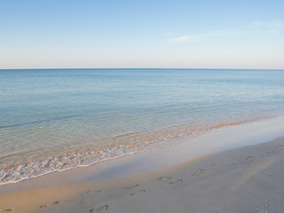 Fototapeta na wymiar Sand, sea and sky, landscape background