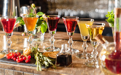 Alcohol in Shot Glasses with berries