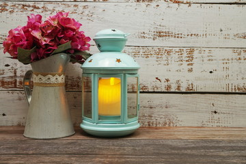 Blue Lantern decorative with candles with space copy on wooden background