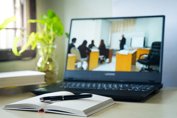 Concept of student watching lesson online on PC and studying from home. Online study and work from concept during COVID-19 pandemic.