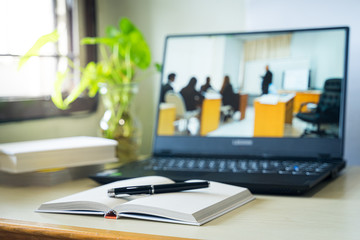 Concept of student watching lesson online on PC and studying from home. Online study and work from concept during COVID-19 pandemic.