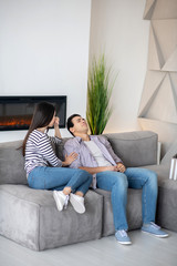 Obraz premium Young lost man and his caring wife.