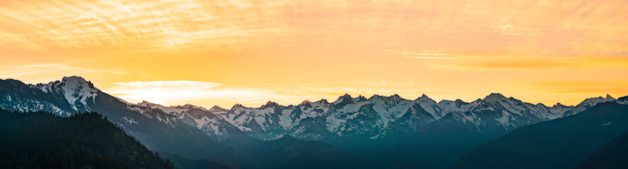 Fototapeta na wymiar panorama of Mountain peaks landscape at sunset.