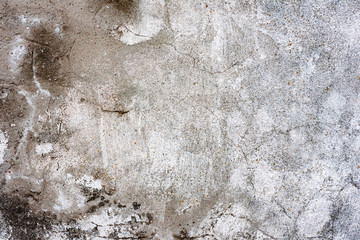 Obraz premium Texture of a concrete wall with cracks and scratches which can be used as a background