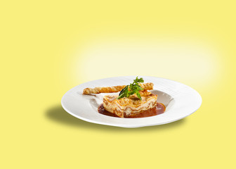 Macaroni schotel or macaroni casserole or mashed potato, with cheese stick.