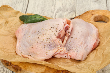 Raw chicken hip with spices