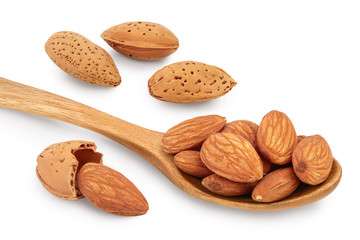 Almonds nuts in wooden spoon isolated on white background with clipping path and full depth of field.