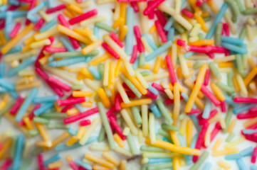 Fototapeta na wymiar Blurred colorful background and wallpaper from a sweet pastry topping for baking.