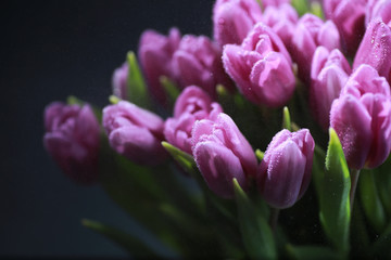 Bouquet of fresh flowers. Holiday gift to your loved one. Background St. Valentine's Day. Rose, tulip, iris flower arrangement.