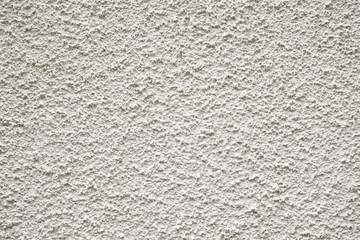 Grey unfinished wall texture. Rough wall surface.