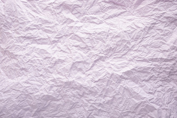Crumpled purple paper background. Paper texture.