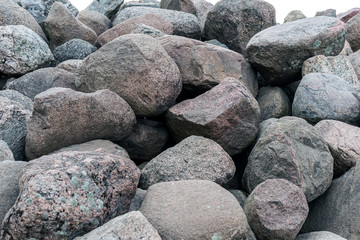 Close-up large pile of big gray stones.