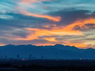 Sunset view of the beautiful strip skyline with red clouds