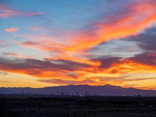 Sunset view of the beautiful strip skyline with red clouds