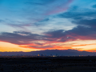Sunset view of the beautiful strip skyline with red clouds