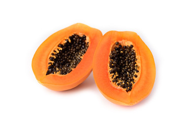 Half ripe papaya fruit with seed on white background, Tropical fruit